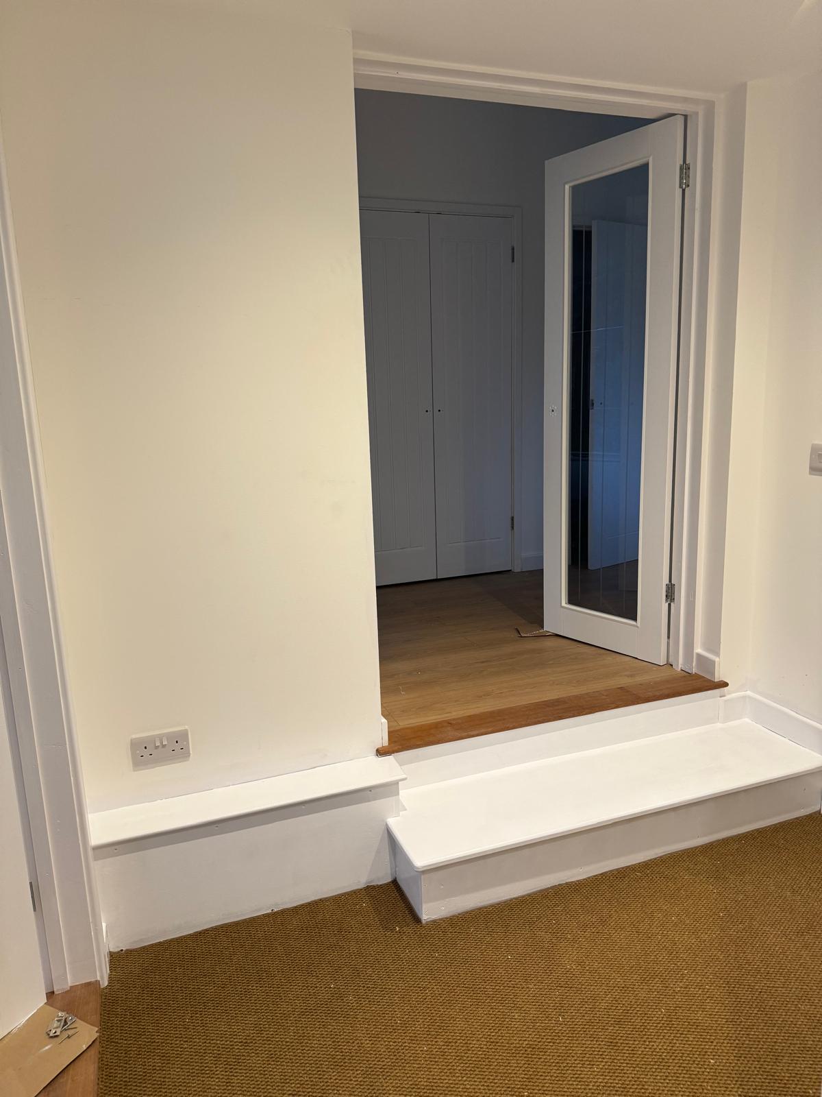 Interior room with window seat and professional painting